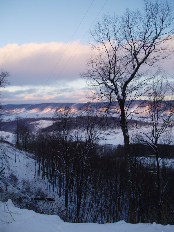 setting sun on mountains, view 3